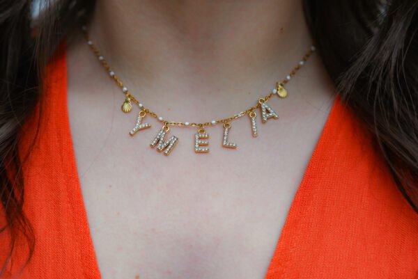 Collier doré perles blanches