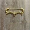 Broche dorée